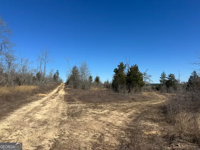 a view of lake with mountain in the back