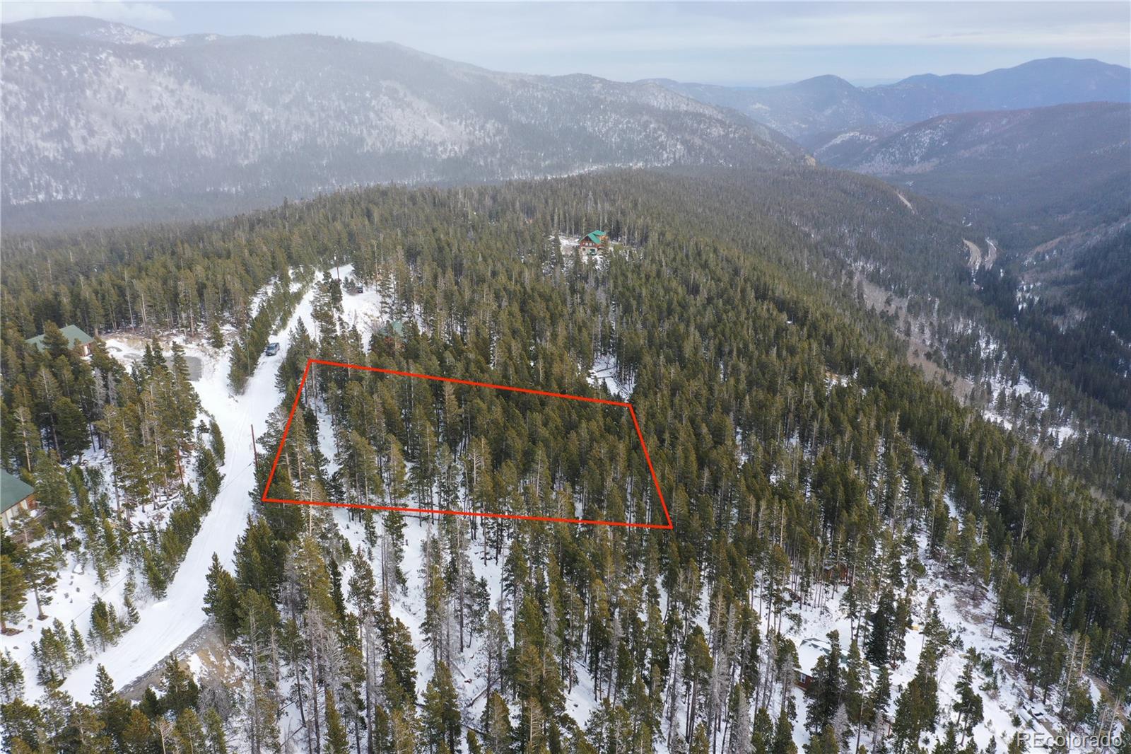 Lot 37 Vista Road Idaho Springs, CO 80452 - Photo 13 of 27 a view of a forest with mountains in the background