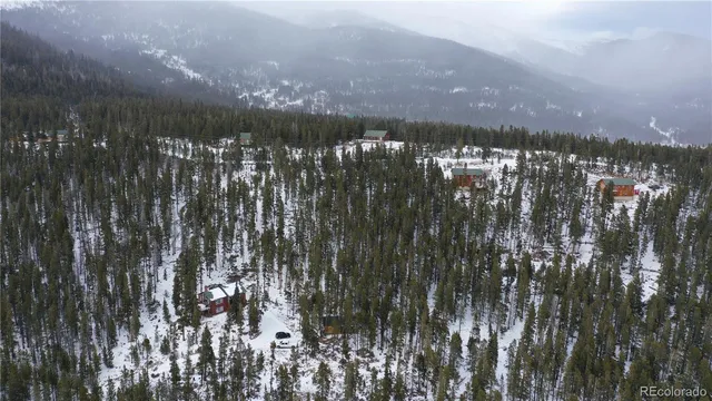 a view of mountain view with mountains in the background
