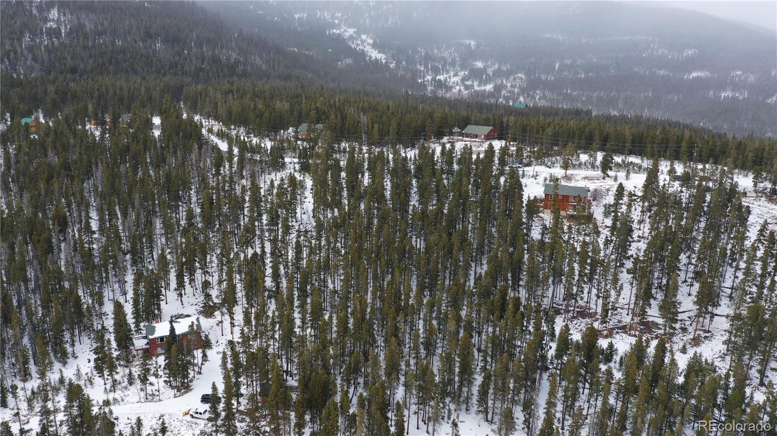Lot 37 Vista Road Idaho Springs, CO 80452 - Photo 19 of 27 a view of a city with lots of trees