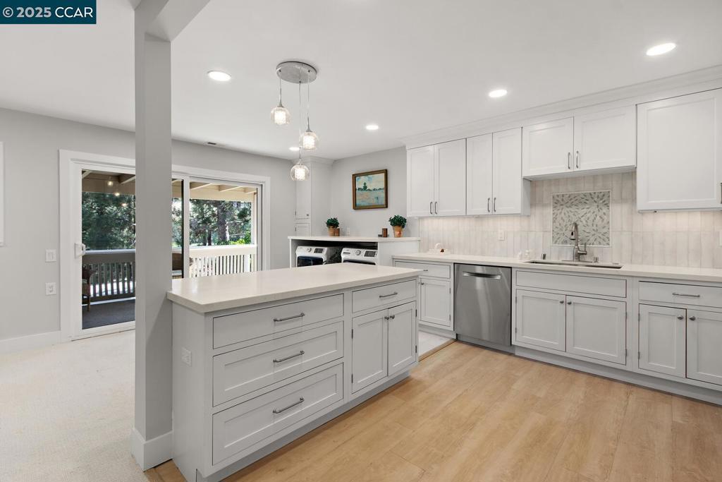 1132 Running Springs Road Walnut Creek, CA 94595 - Photo 3 of 7 a kitchen with cabinets oven and a sink