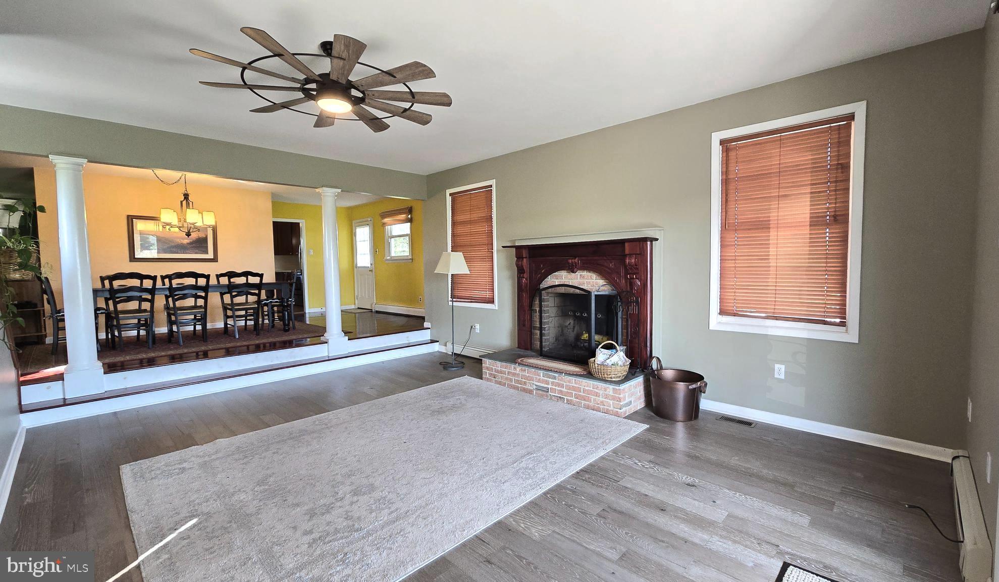 455 England Creamery Road North East, MD 21901 - Photo 18 of 42 Brick Fireplace w/flagstone hearth & wood mantle