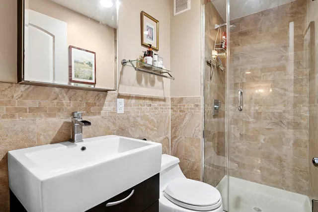 a bedroom with a large bed and a large window