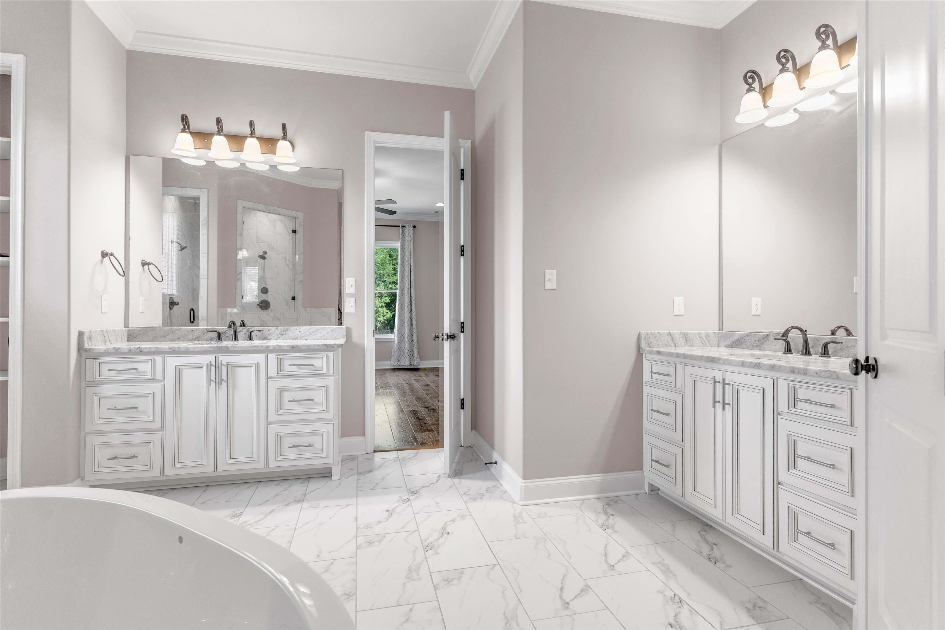 75 Windgrove Cove Piperton, TN 38017 - Photo 23 of 40 a spacious bathroom with a double vanity sink mirror and