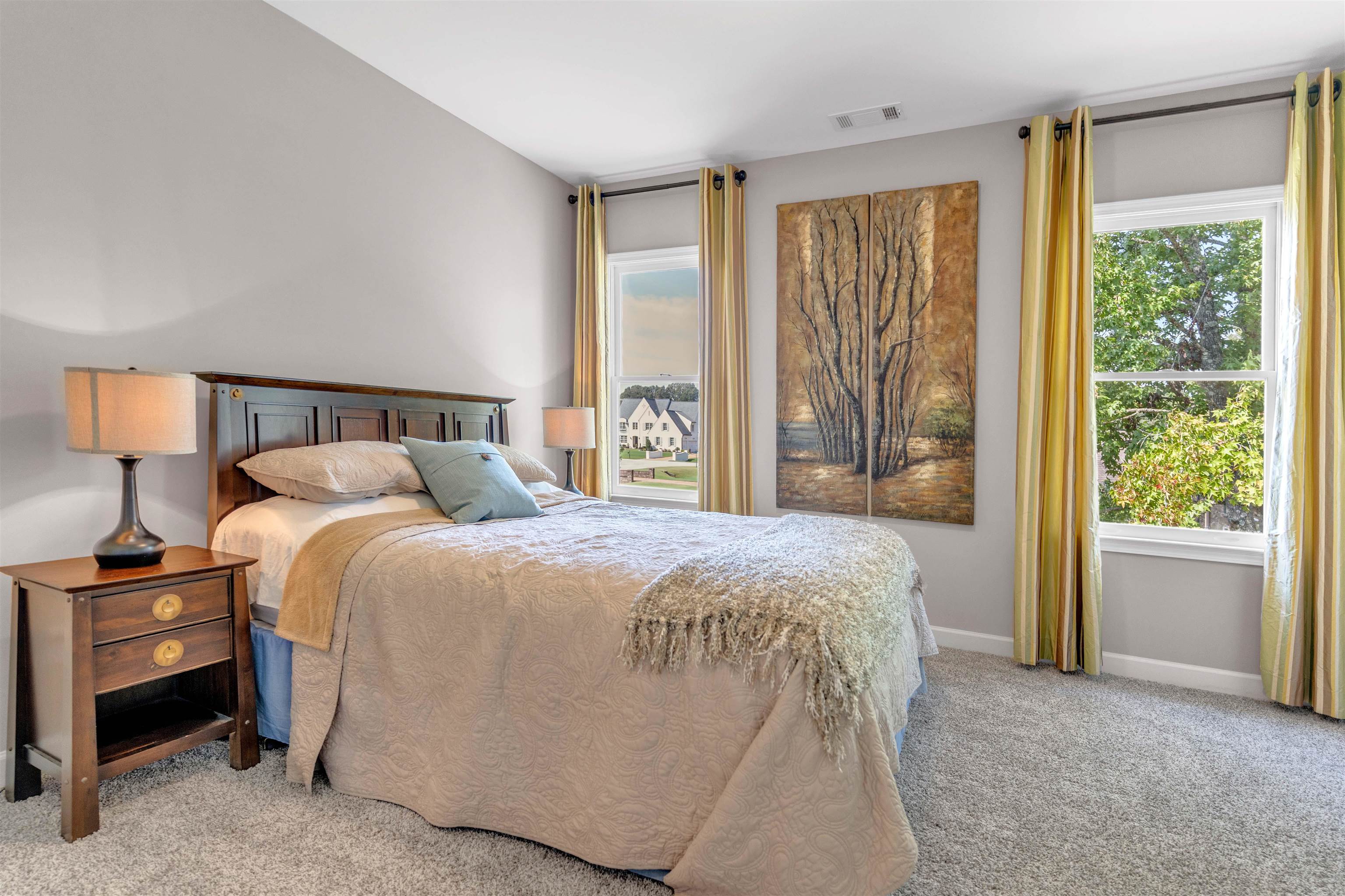 75 Windgrove Cove Piperton, TN 38017 - Photo 32 of 40 a bedroom with a bed and a large window