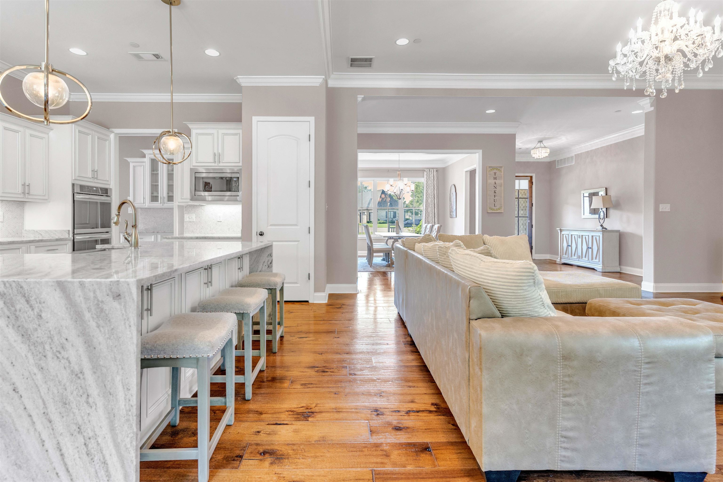 75 Windgrove Cove Piperton, TN 38017 - Photo 9 of 40 a lobby with furniture and a chandelier