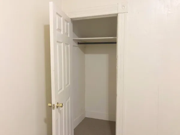 a kitchen with a stove and a refrigerator