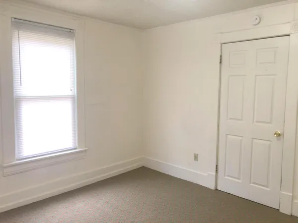 a bathroom with a toilet and a sink