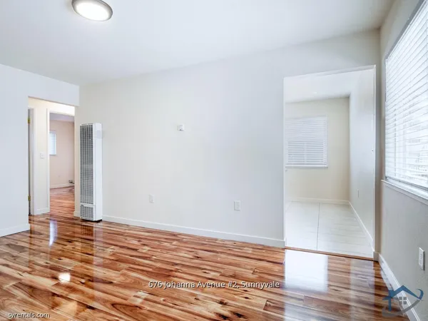 a kitchen with stainless steel appliances granite countertop a refrigerator stove and cabinets