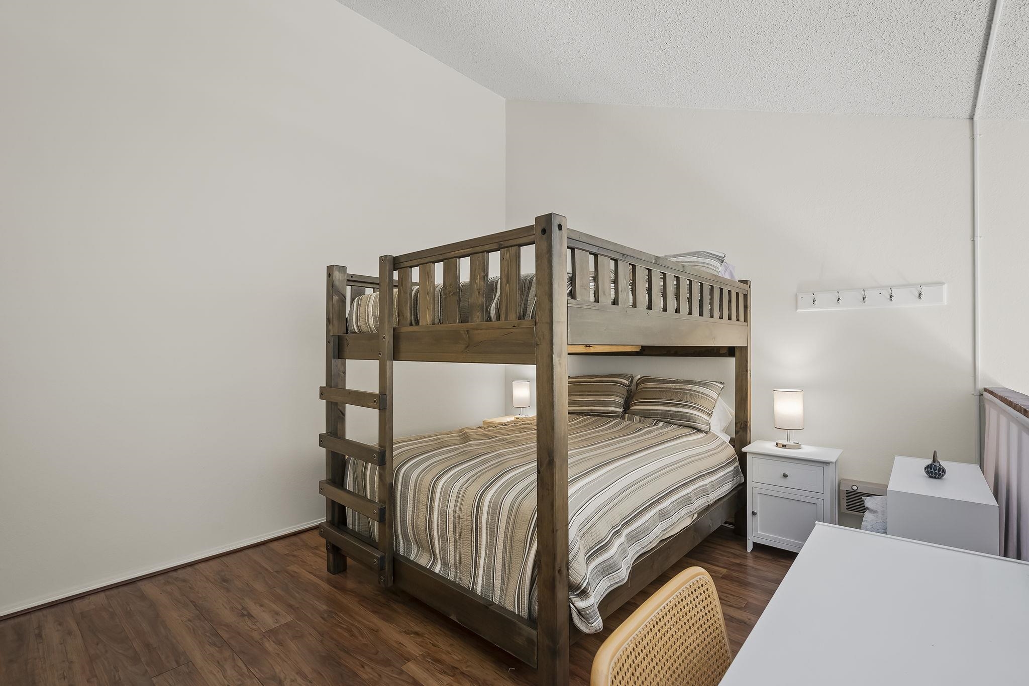 11591 Snowpeak Way, Unit 407 Truckee, CA 96161 - Photo 13 of 21 a bedroom with a bed and a window