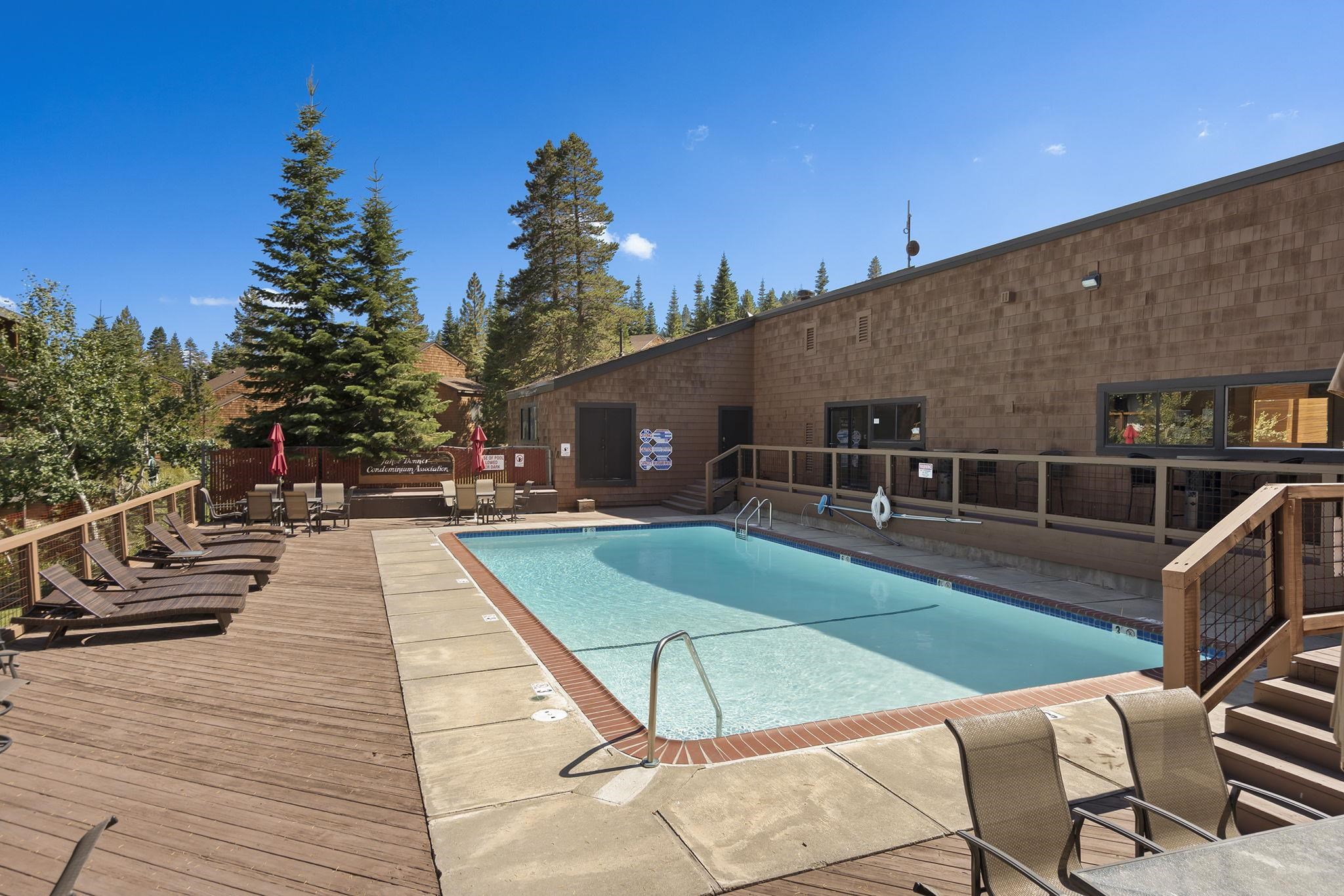 11591 Snowpeak Way, Unit 407 Truckee, CA 96161 - Photo 20 of 21 a view of a patio with chairs and potted plants