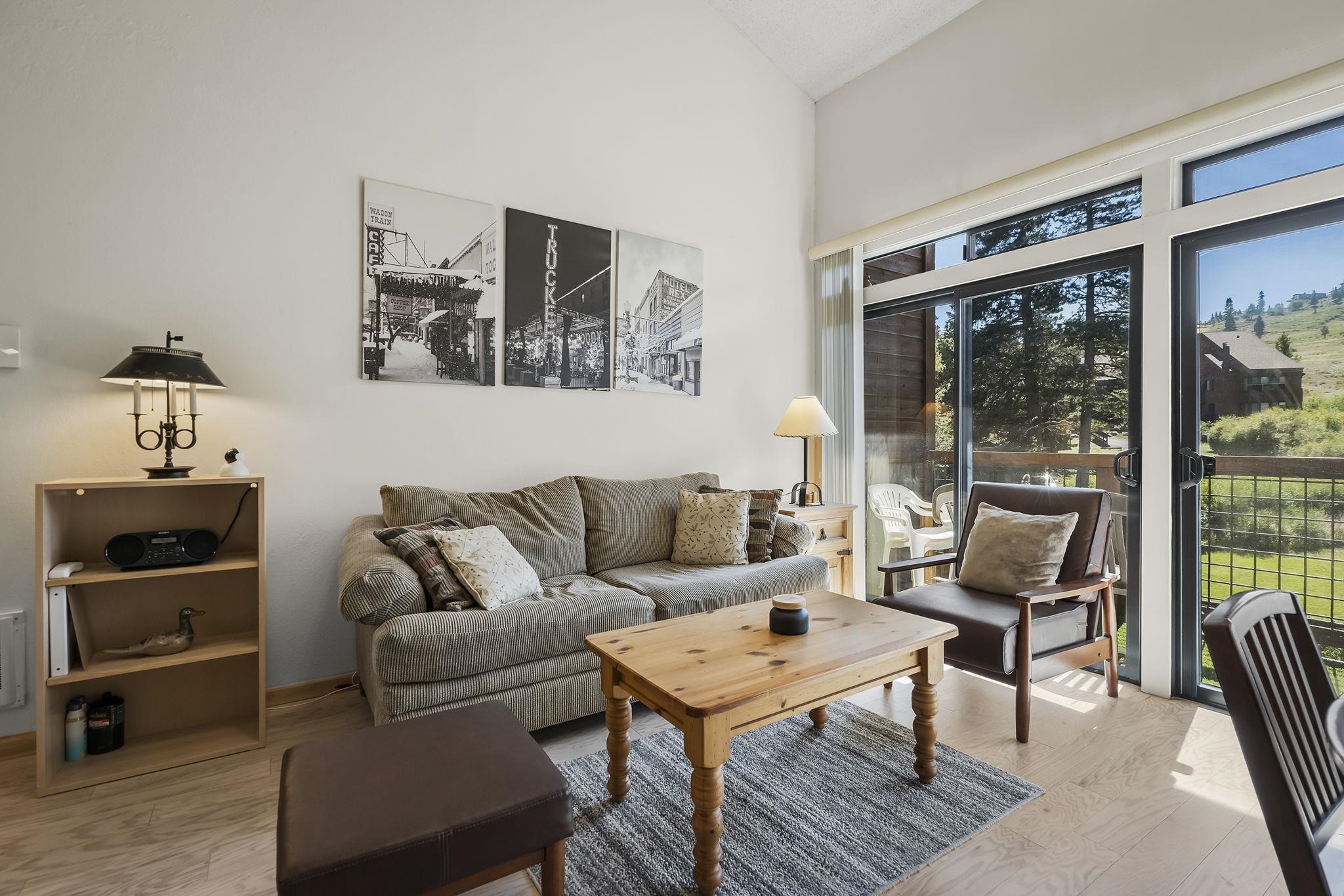 11591 Snowpeak Way, Unit 407 Truckee, CA 96161 - Photo 5 of 21 a living room with furniture and a window