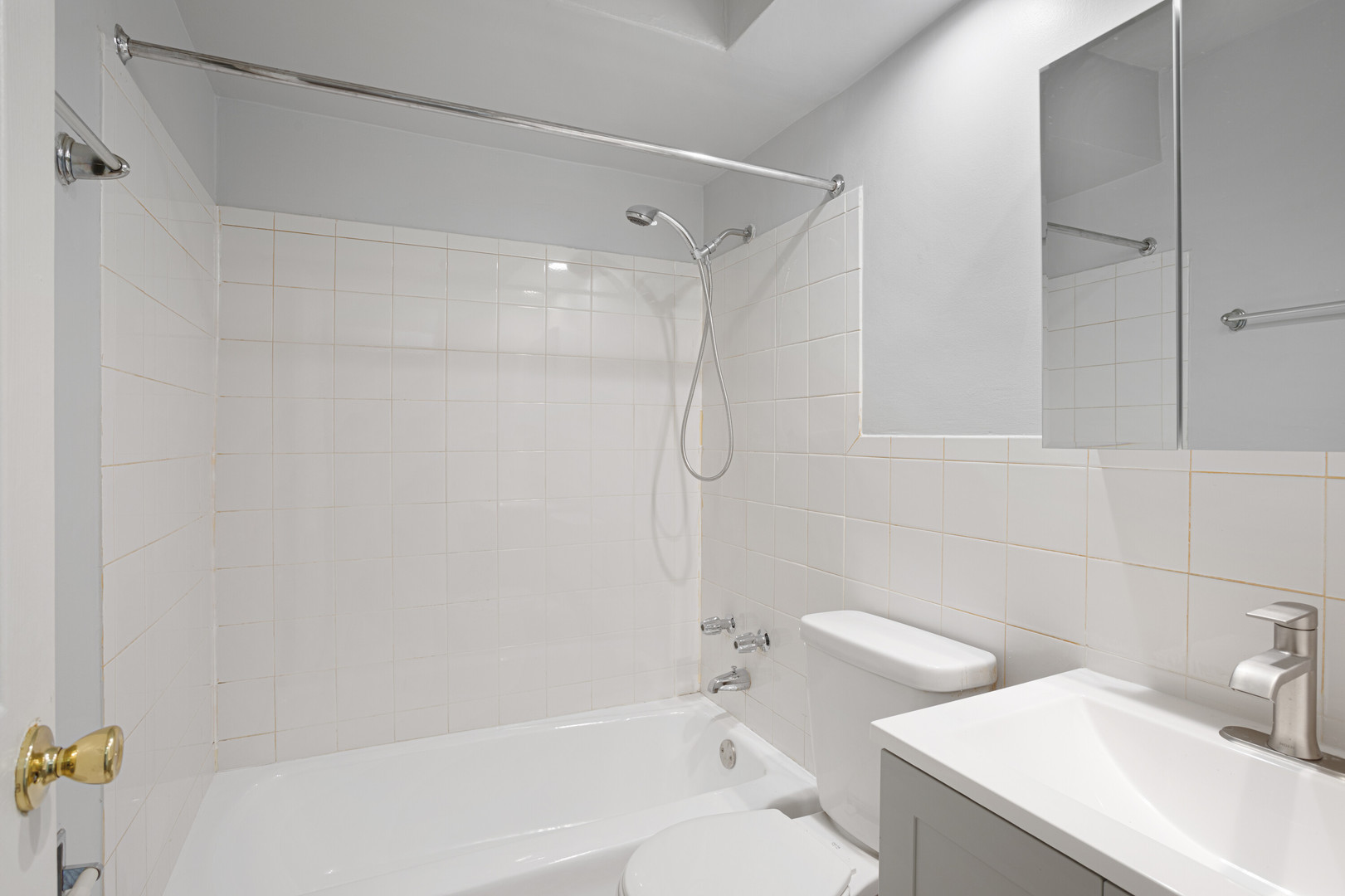 6758 North Sheridan Road, Unit 247 Chicago, IL 60626 - Photo 10 of 13 a bathroom with a shower and a toilet sink