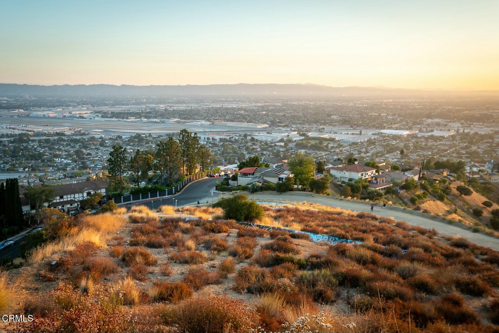 9999 Edmore Place Sun Valley, CA 91352 - Photo 15 of 22 a view of a town with mountains in the background