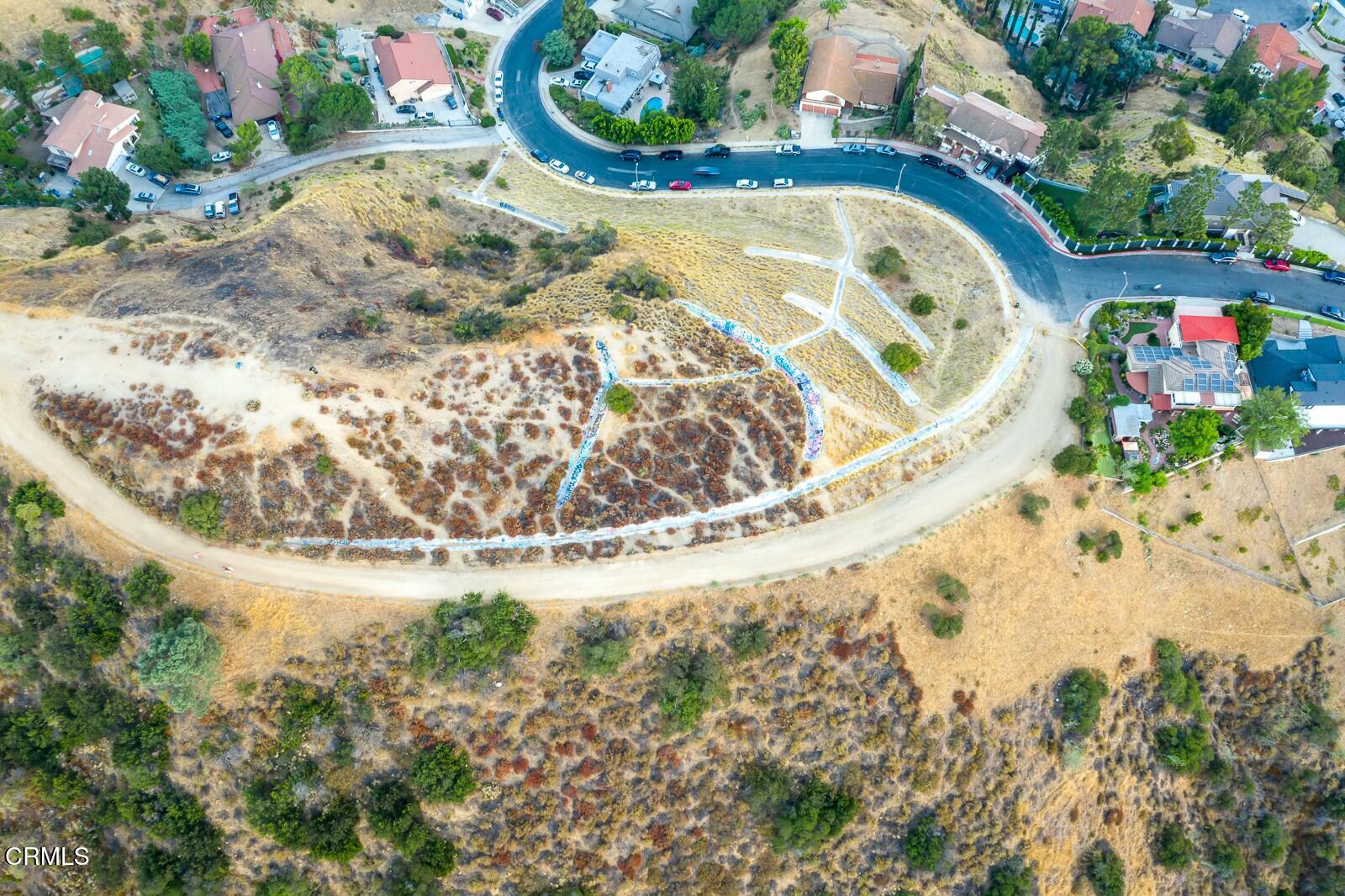 9999 Edmore Place Sun Valley, CA 91352 - Photo 6 of 22 a view of a swimming pool in a backyard
