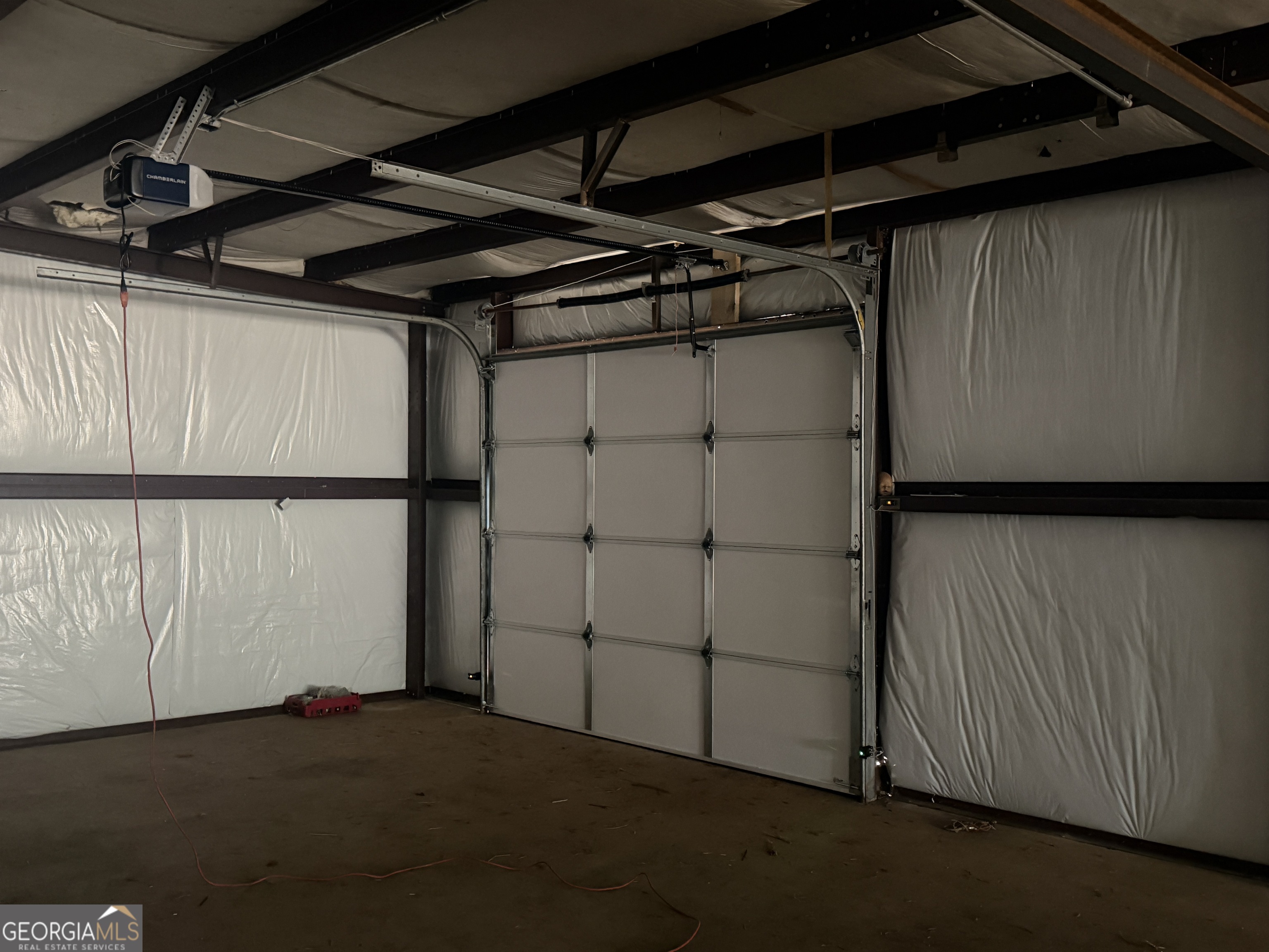 90 Rivers Road Williamson, GA 30292 - Photo 3 of 5 a view of a room with racks on the wall