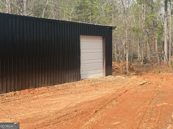 a house with trees in front of it