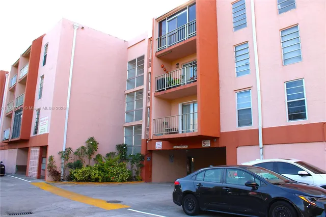 a front view of a building with a street