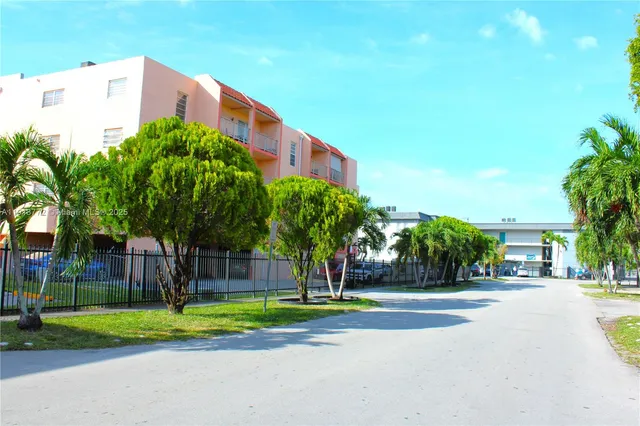 a view of a building with a street