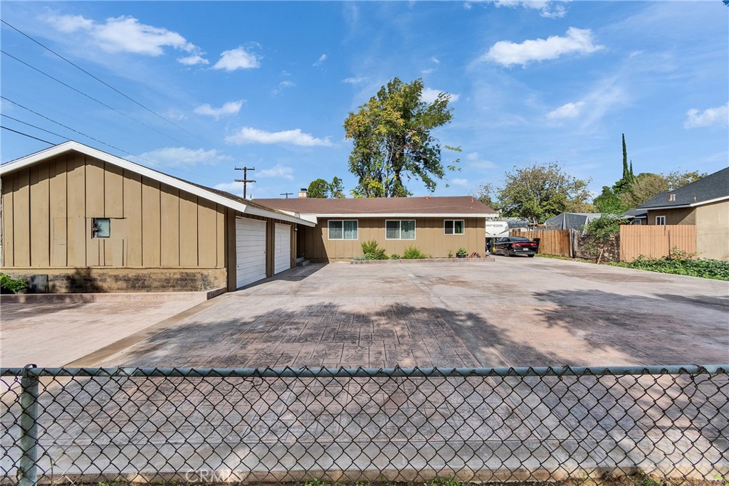 5121 Sierra Street Riverside, CA 92504 - Photo 11 of 34 a view of a house with a outdoor space