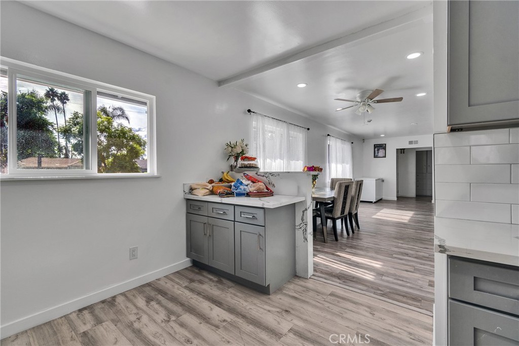 5121 Sierra Street Riverside, CA 92504 - Photo 20 of 34 a kitchen with stainless steel appliances granite countertop a stove and a refrigerator