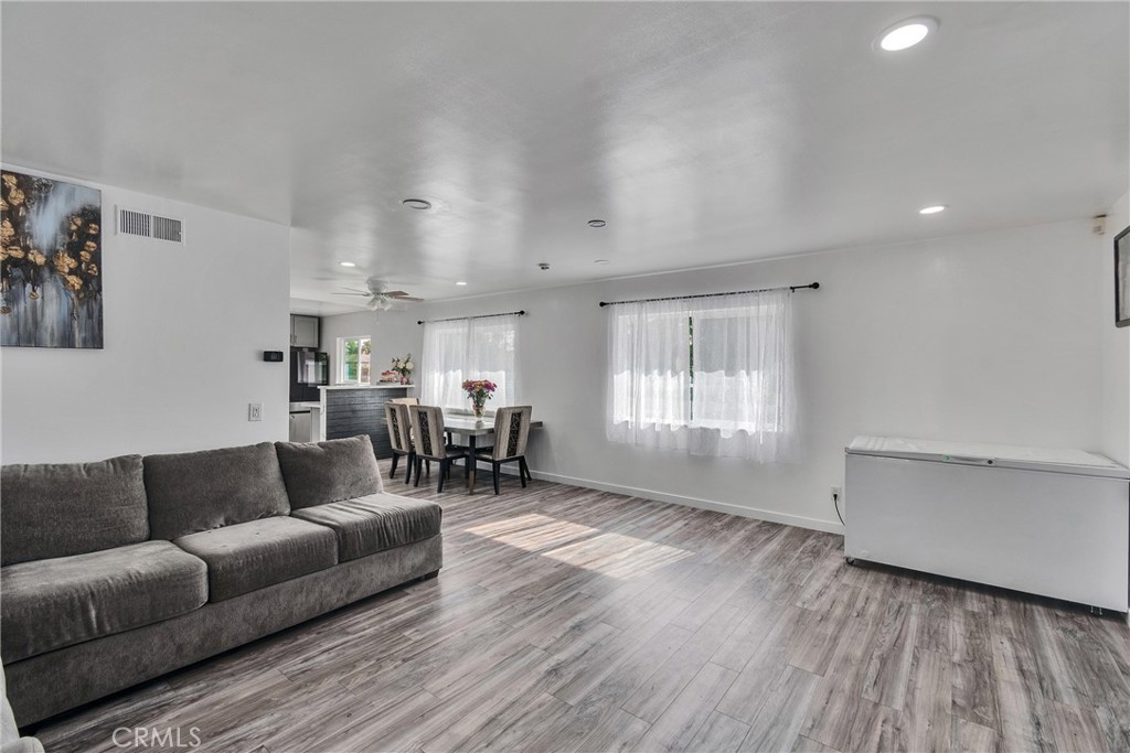 5121 Sierra Street Riverside, CA 92504 - Photo 21 of 34 a living room with furniture and wooden floor
