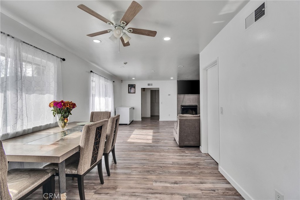 5121 Sierra Street Riverside, CA 92504 - Photo 31 of 34 a view of a dining room with furniture and a potted plant