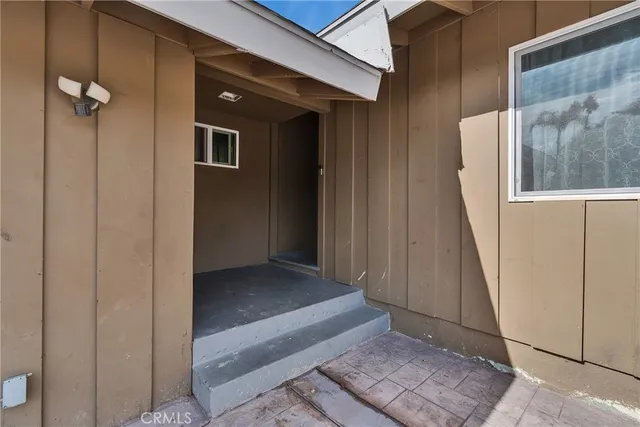 a view of a hallway with closet