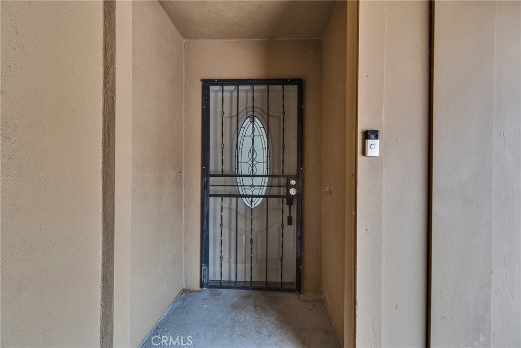 5121 Sierra Street Riverside, CA 92504 - Photo 9 of 34 a view of a wooden door