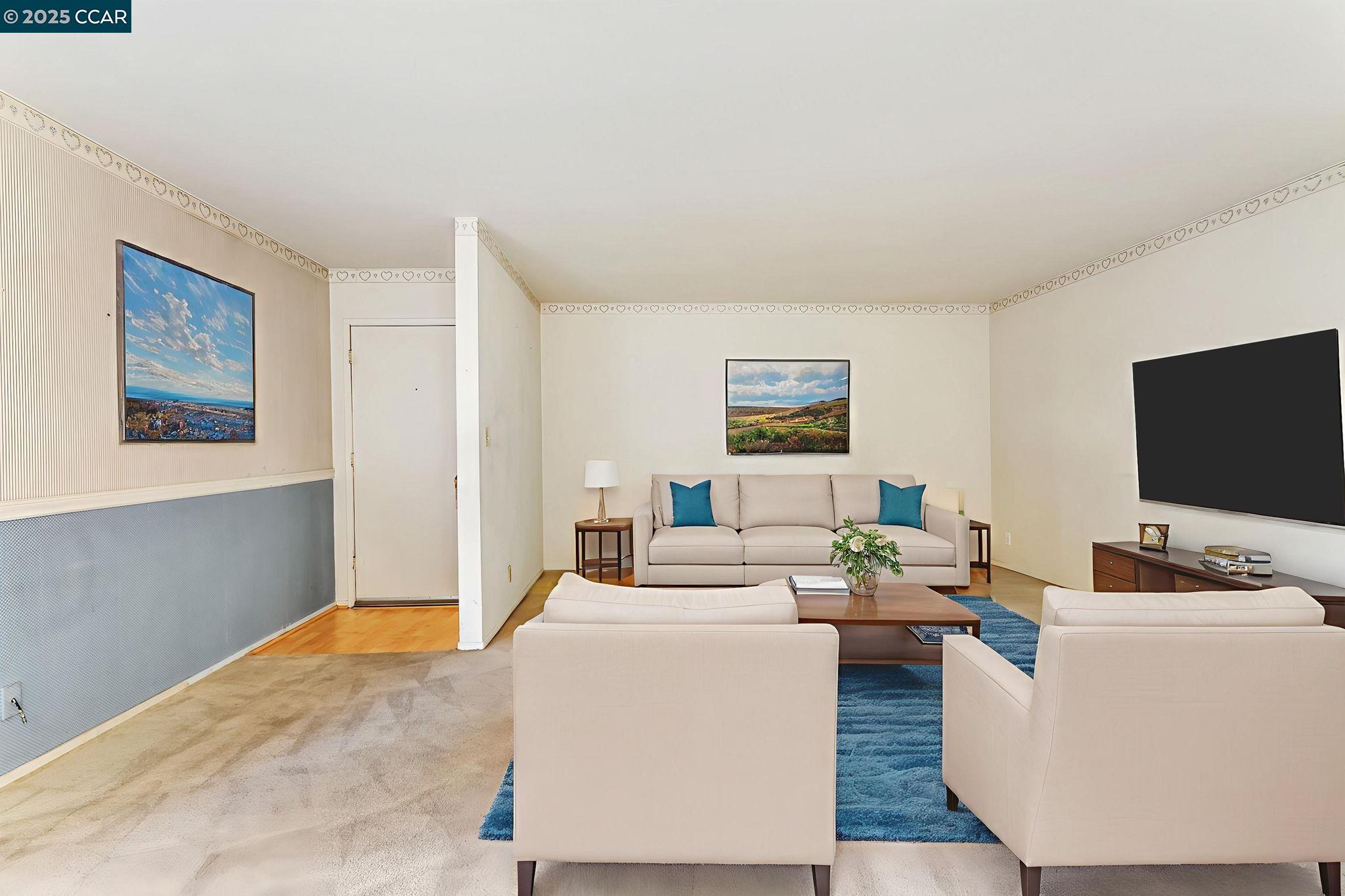 9085 Alcosta Boulevard, Unit 340 San Ramon, CA 94583 - Photo 5 of 25 a living room with furniture and a flat screen tv