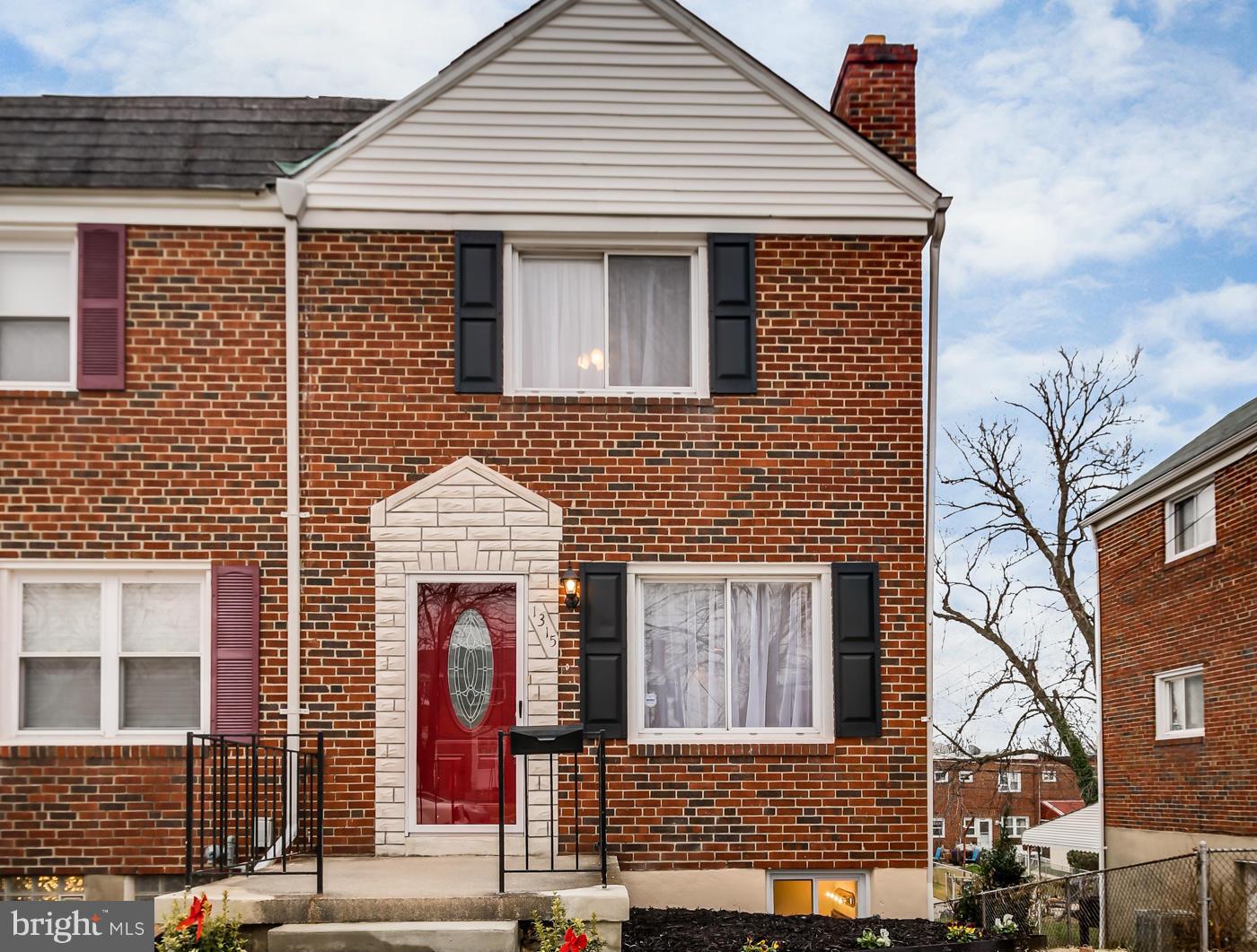 1315 Deanwood Road Baltimore, MD 21234 - Photo 2 of 30 a front view of a house with a door