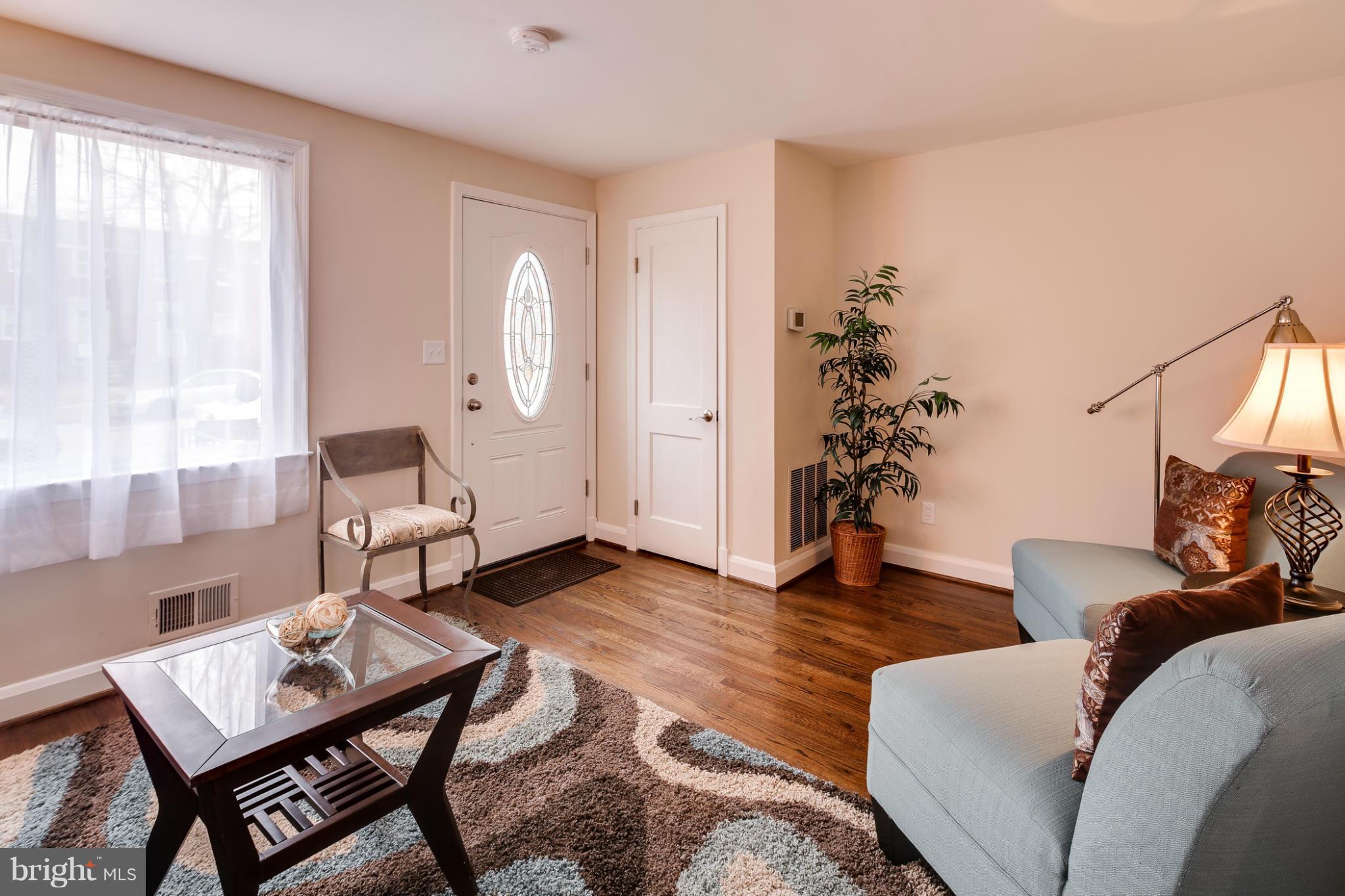 1315 Deanwood Road Baltimore, MD 21234 - Photo 11 of 30 a living room with furniture and wooden floor