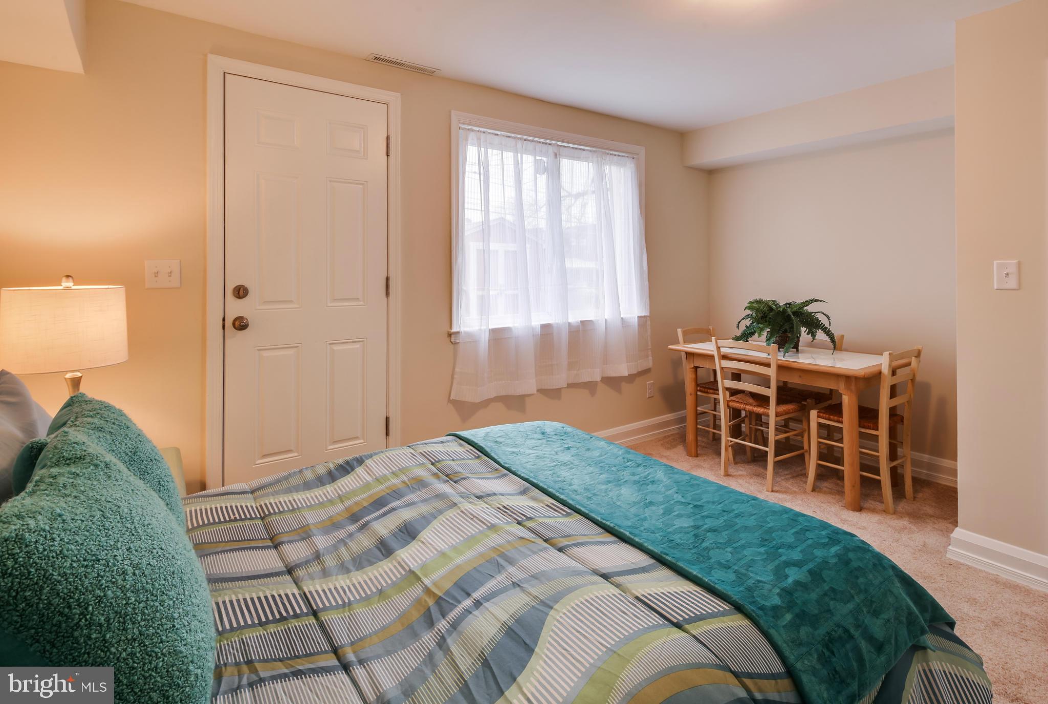 1315 Deanwood Road Baltimore, MD 21234 - Photo 14 of 30 a bedroom with a bed and a window