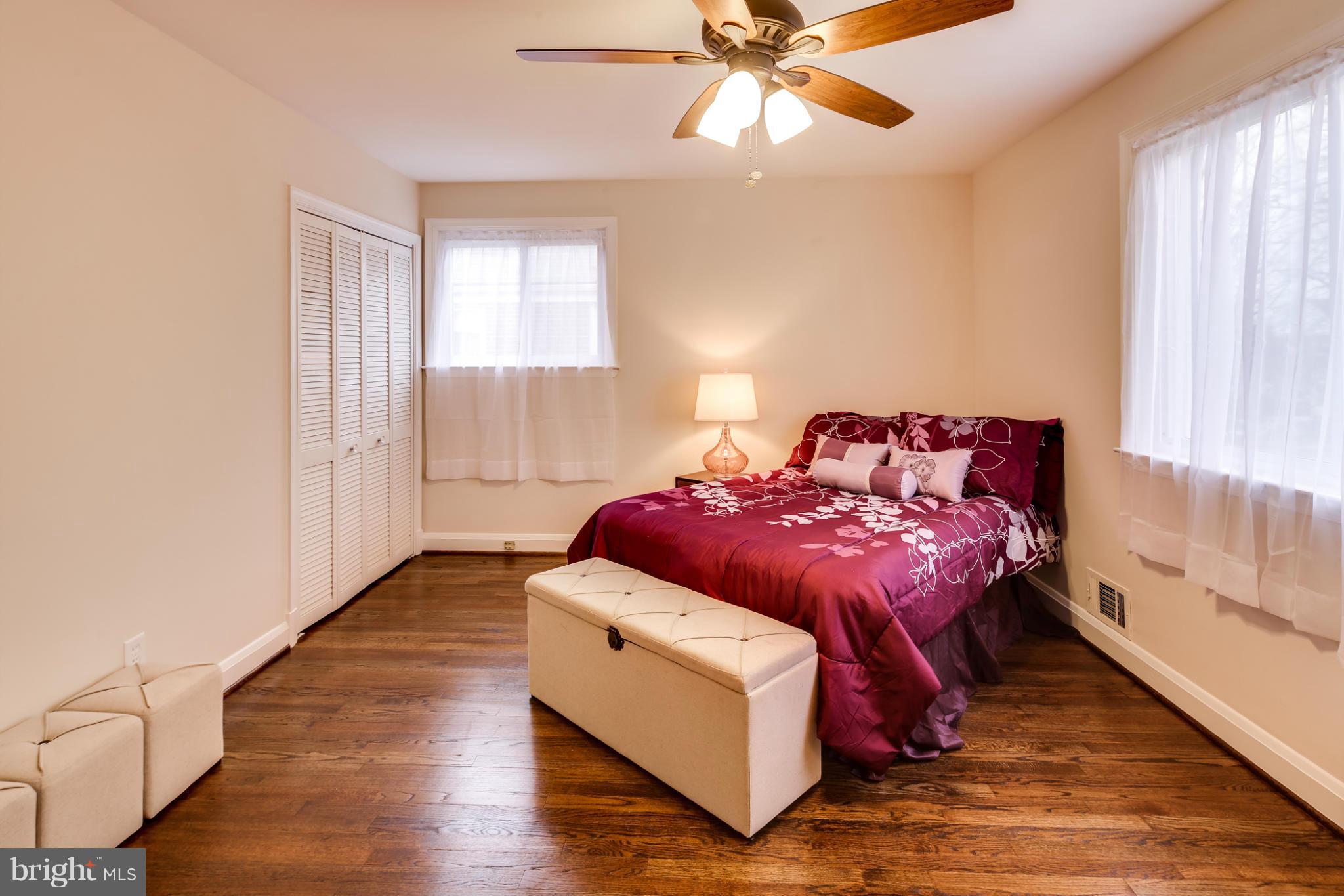 1315 Deanwood Road Baltimore, MD 21234 - Photo 18 of 30 a bedroom with a bed and window