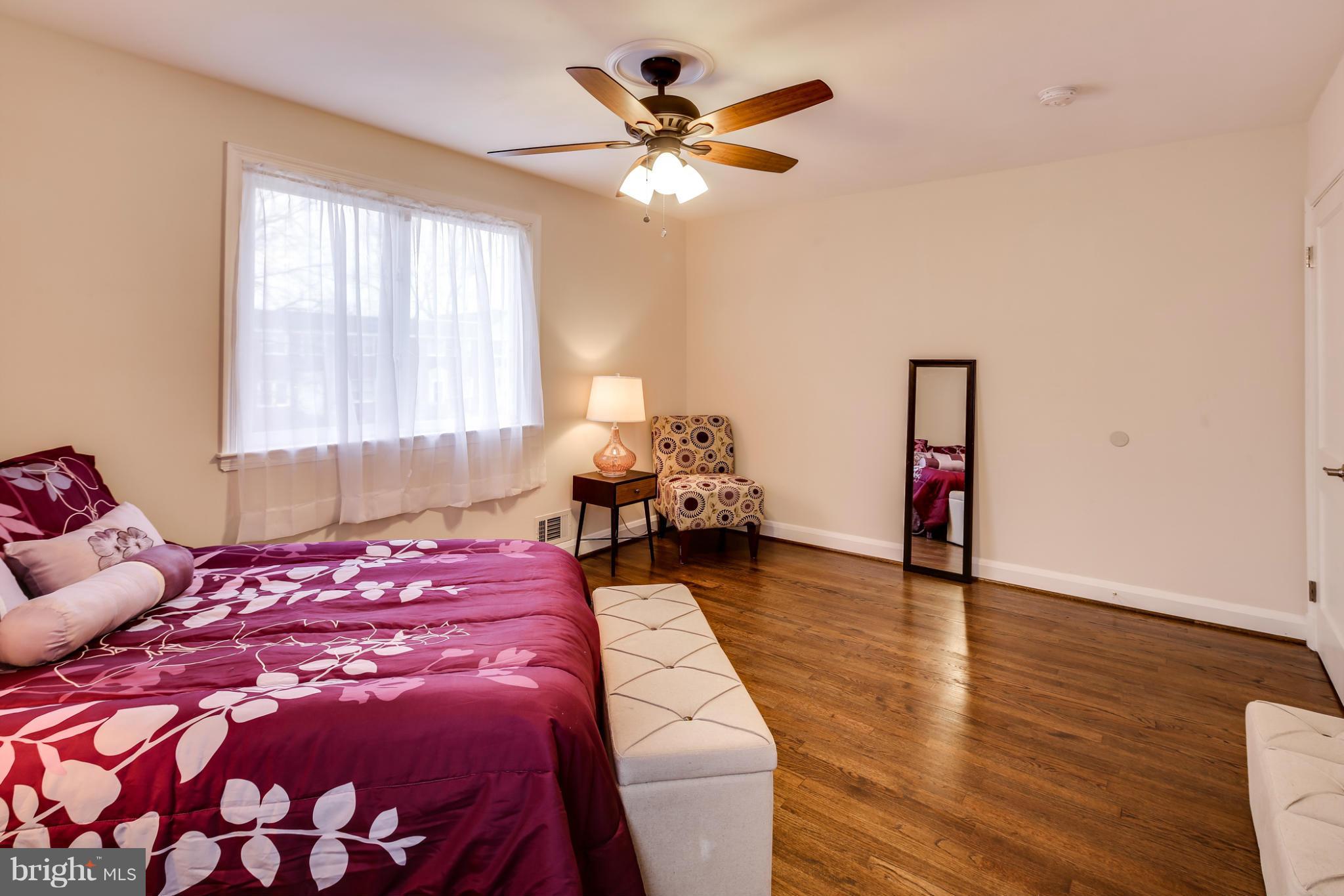 1315 Deanwood Road Baltimore, MD 21234 - Photo 19 of 30 a bedroom with a bed and window