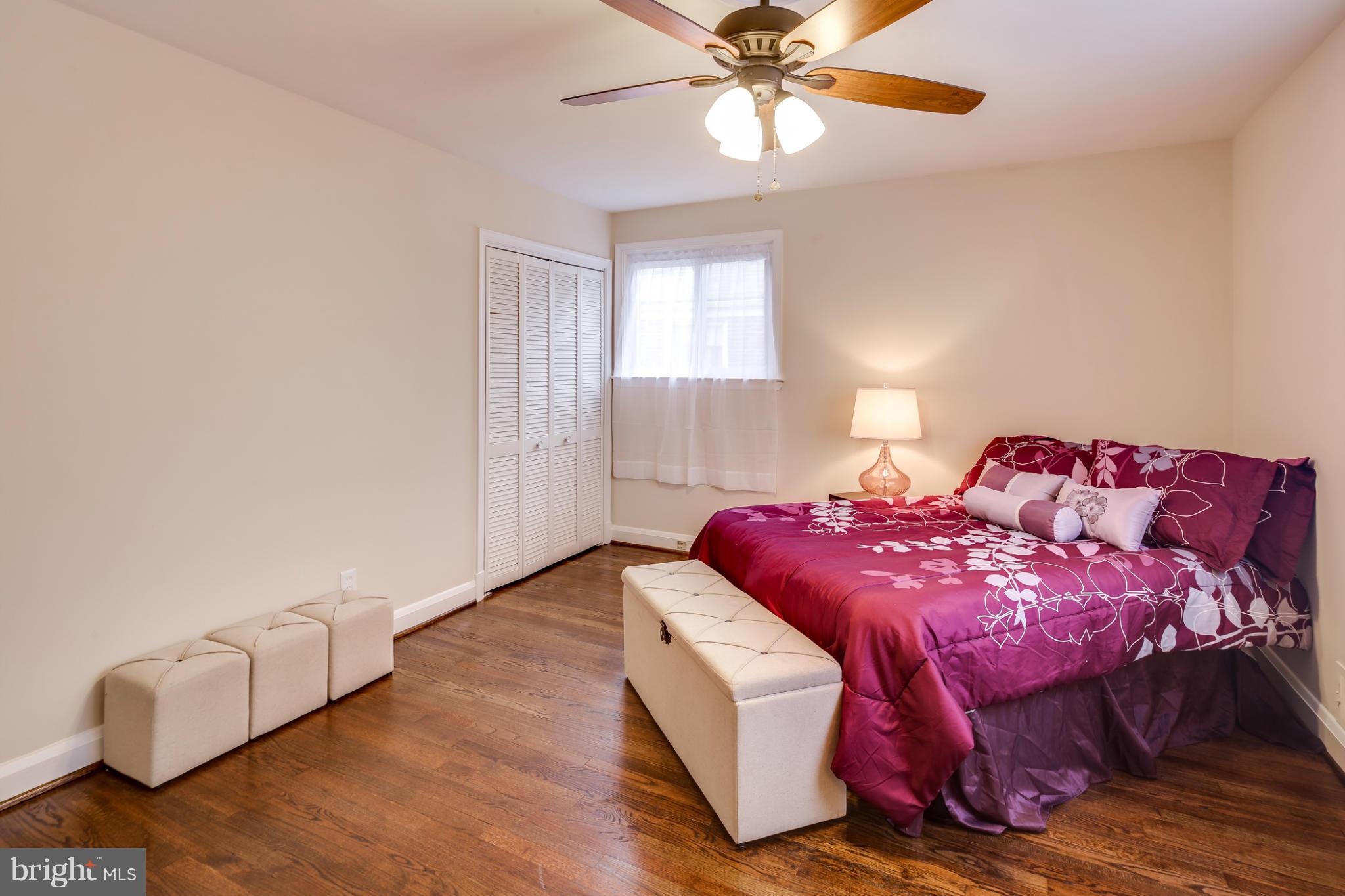 1315 Deanwood Road Baltimore, MD 21234 - Photo 20 of 30 a bedroom with a bed and window