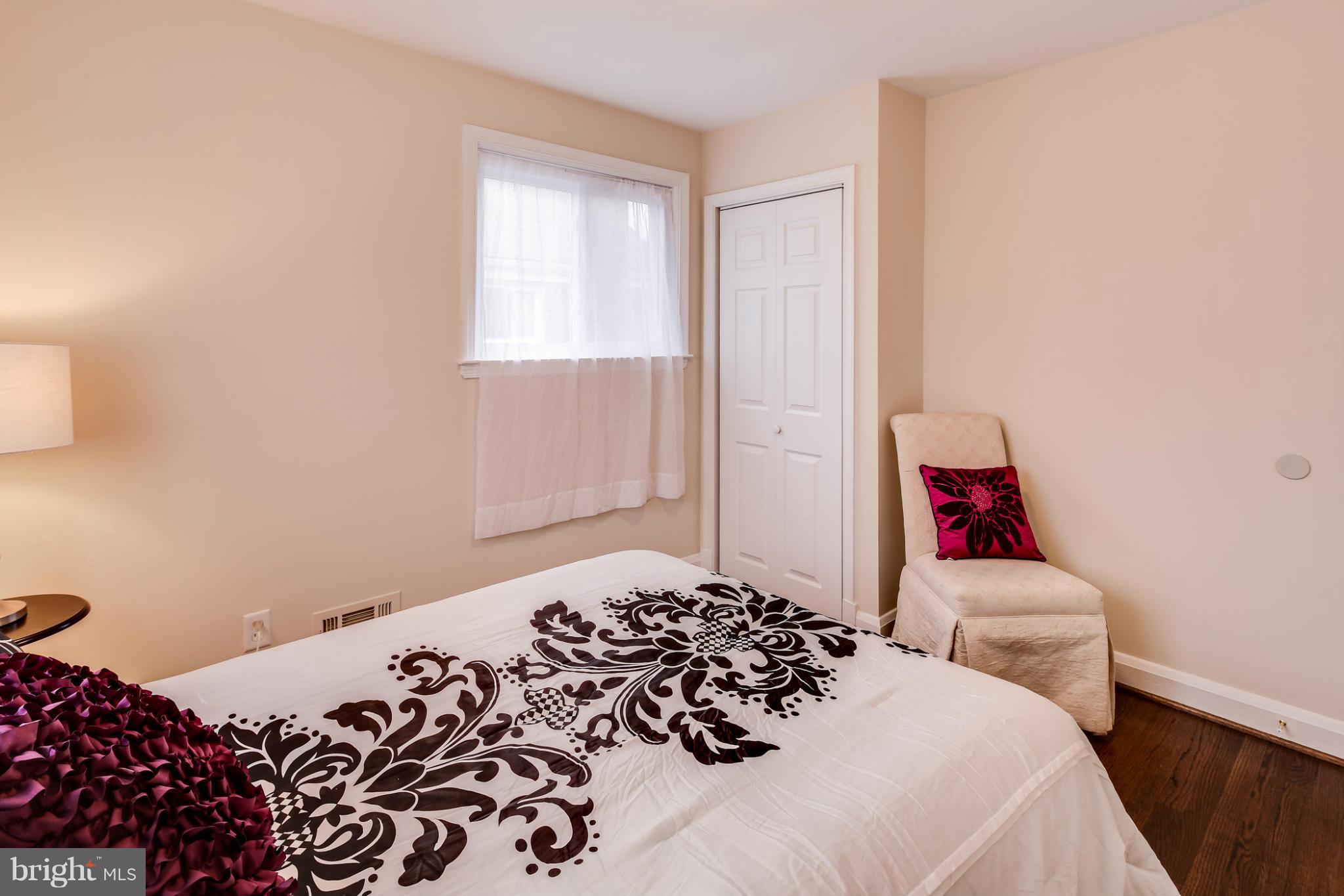 1315 Deanwood Road Baltimore, MD 21234 - Photo 24 of 30 a bedroom with a bed and a window