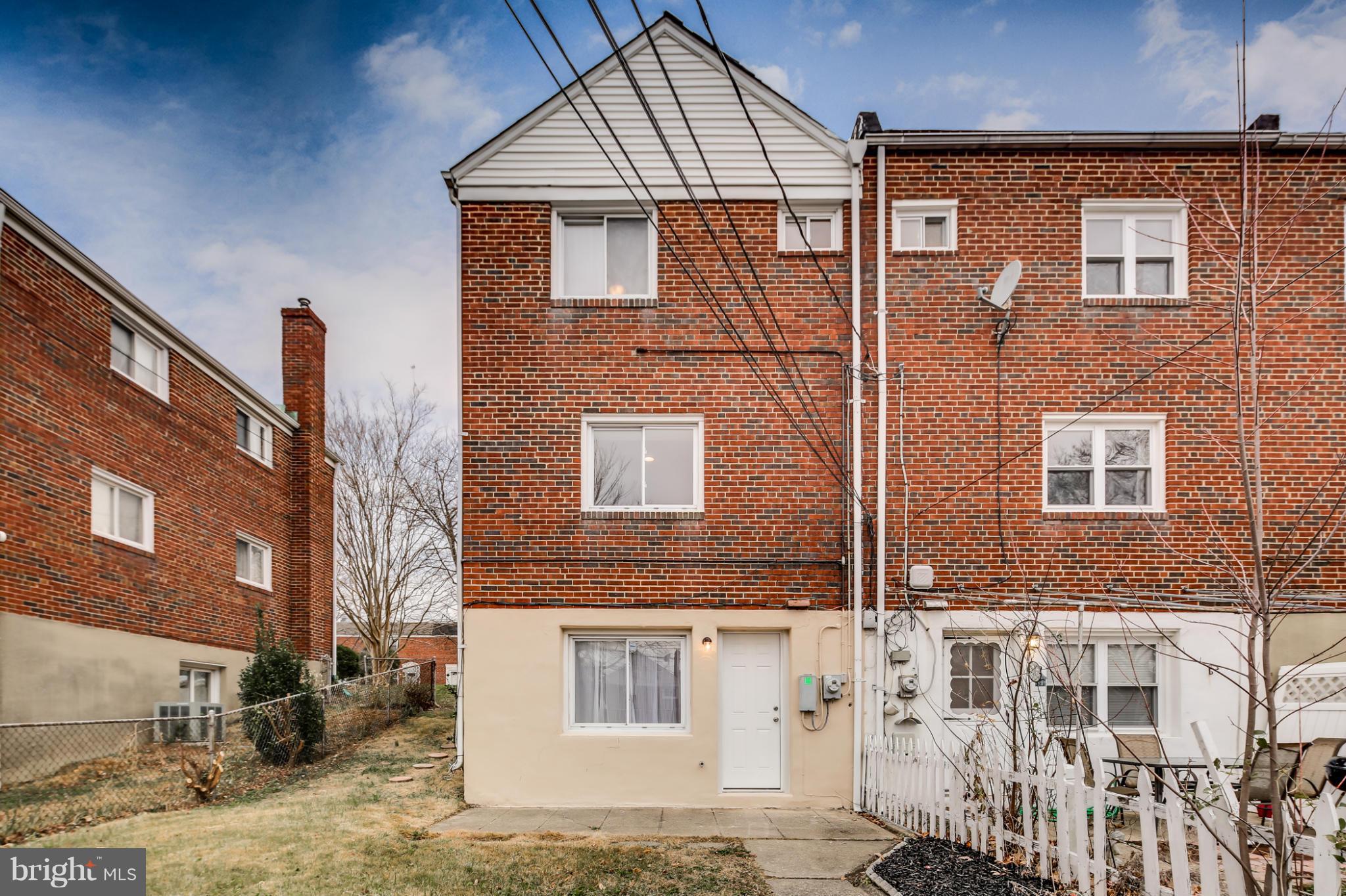 1315 Deanwood Road Baltimore, MD 21234 - Photo 29 of 30 a front view of a house with a yard