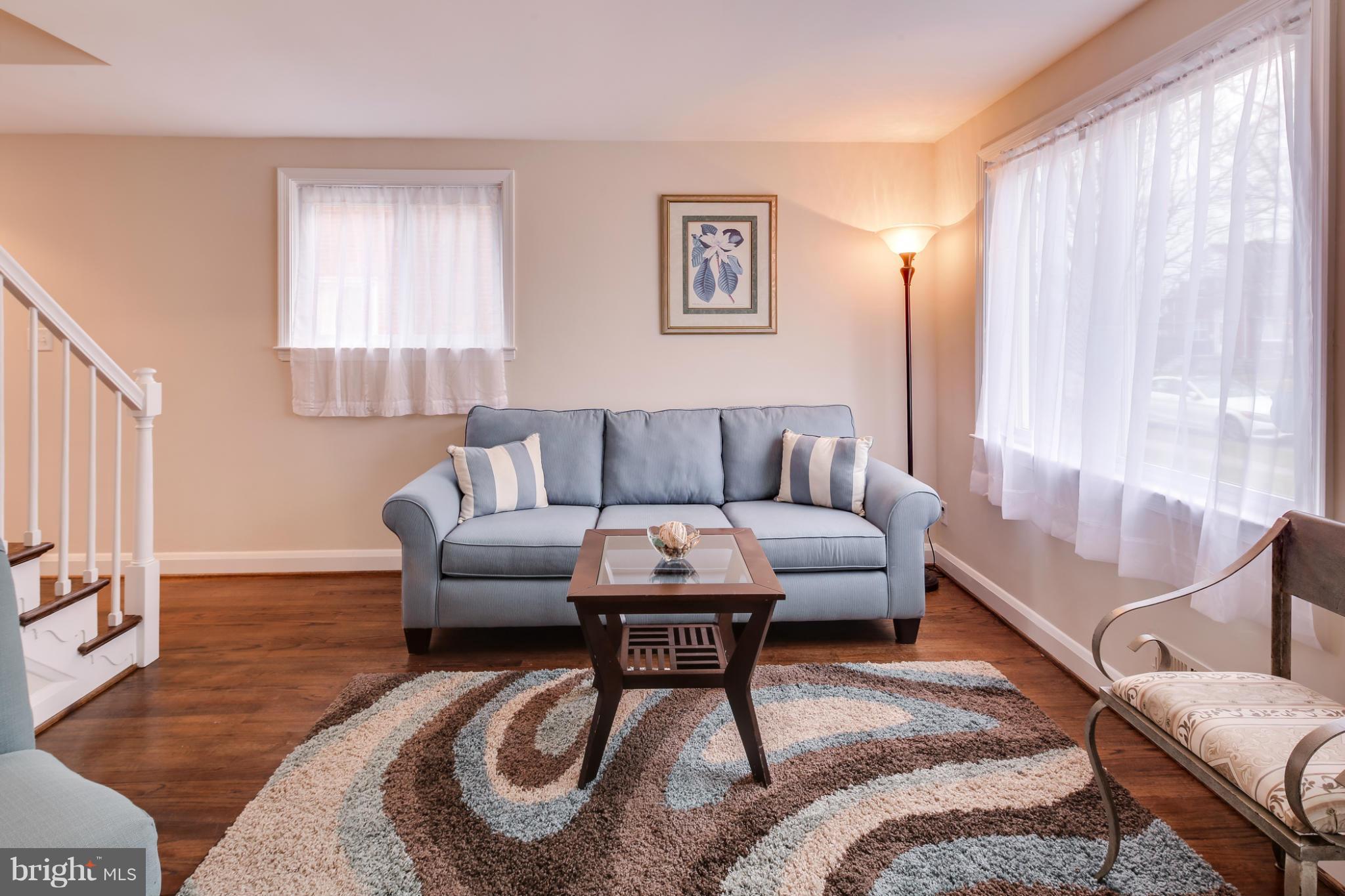 1315 Deanwood Road Baltimore, MD 21234 - Photo 10 of 30 a living room with furniture and a rug