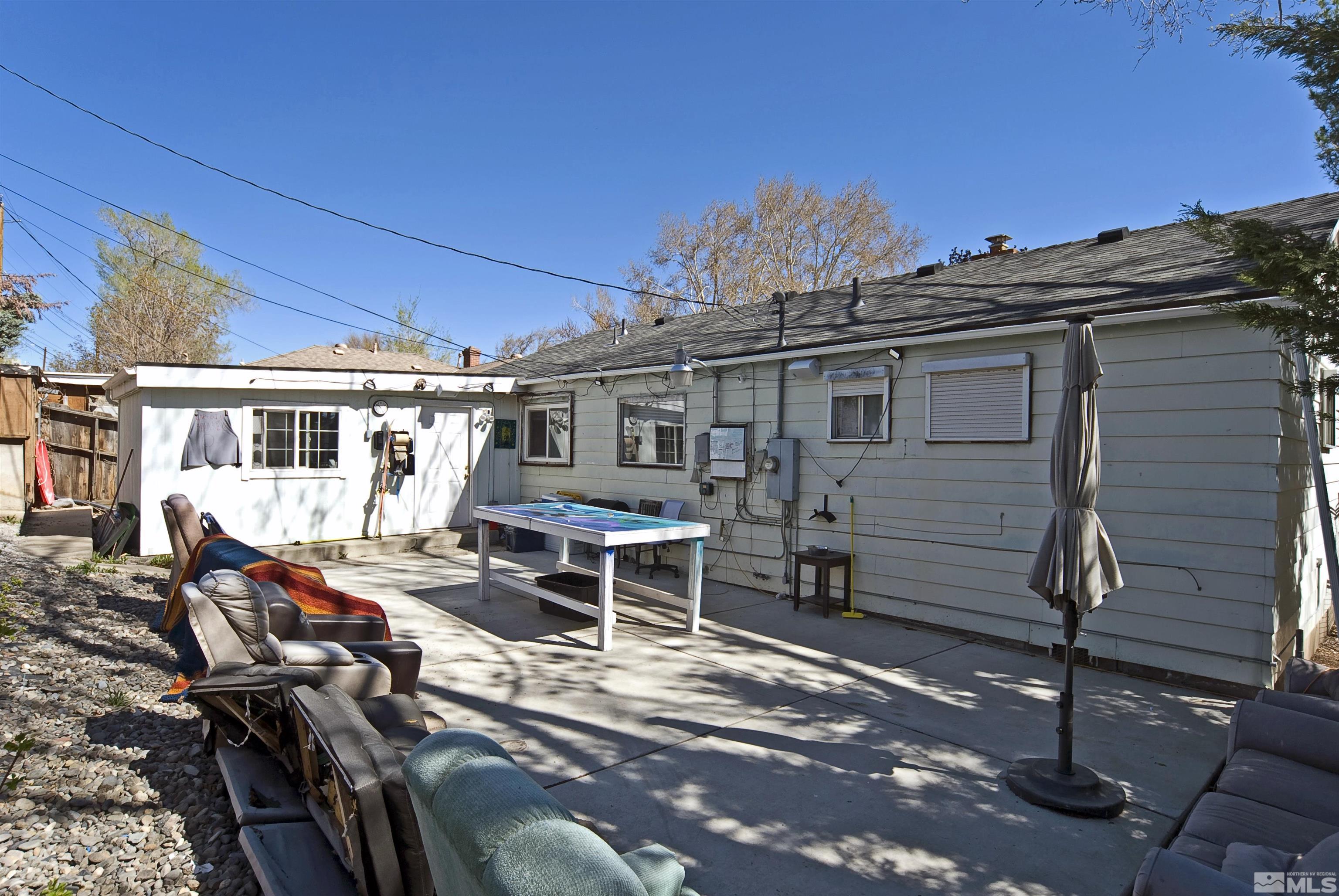121 Bartlett Street Reno, NV 89512 - Photo 15 of 27 a view of a house with backyard and sitting area