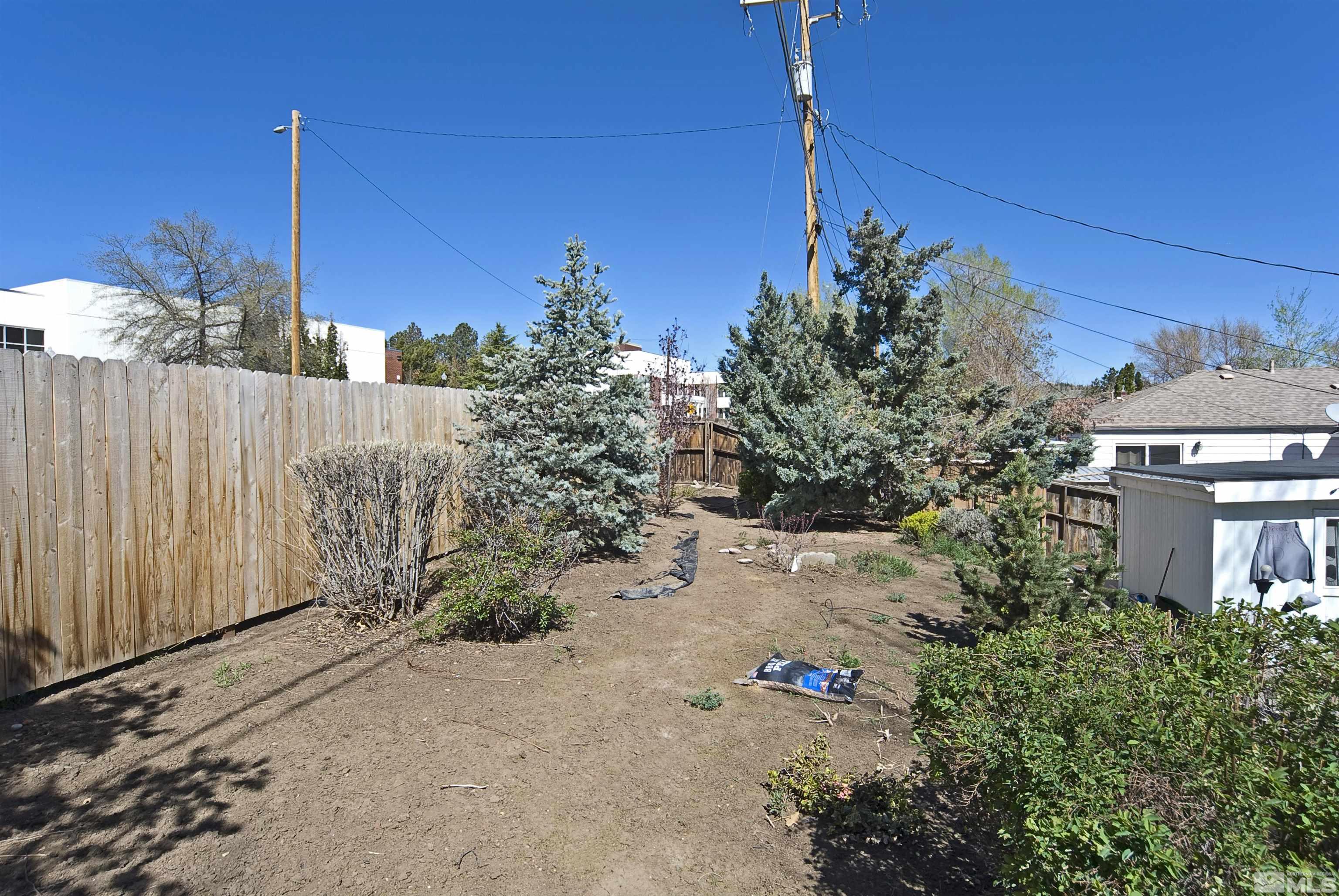 121 Bartlett Street Reno, NV 89512 - Photo 21 of 27 a view of a street with a building in the background