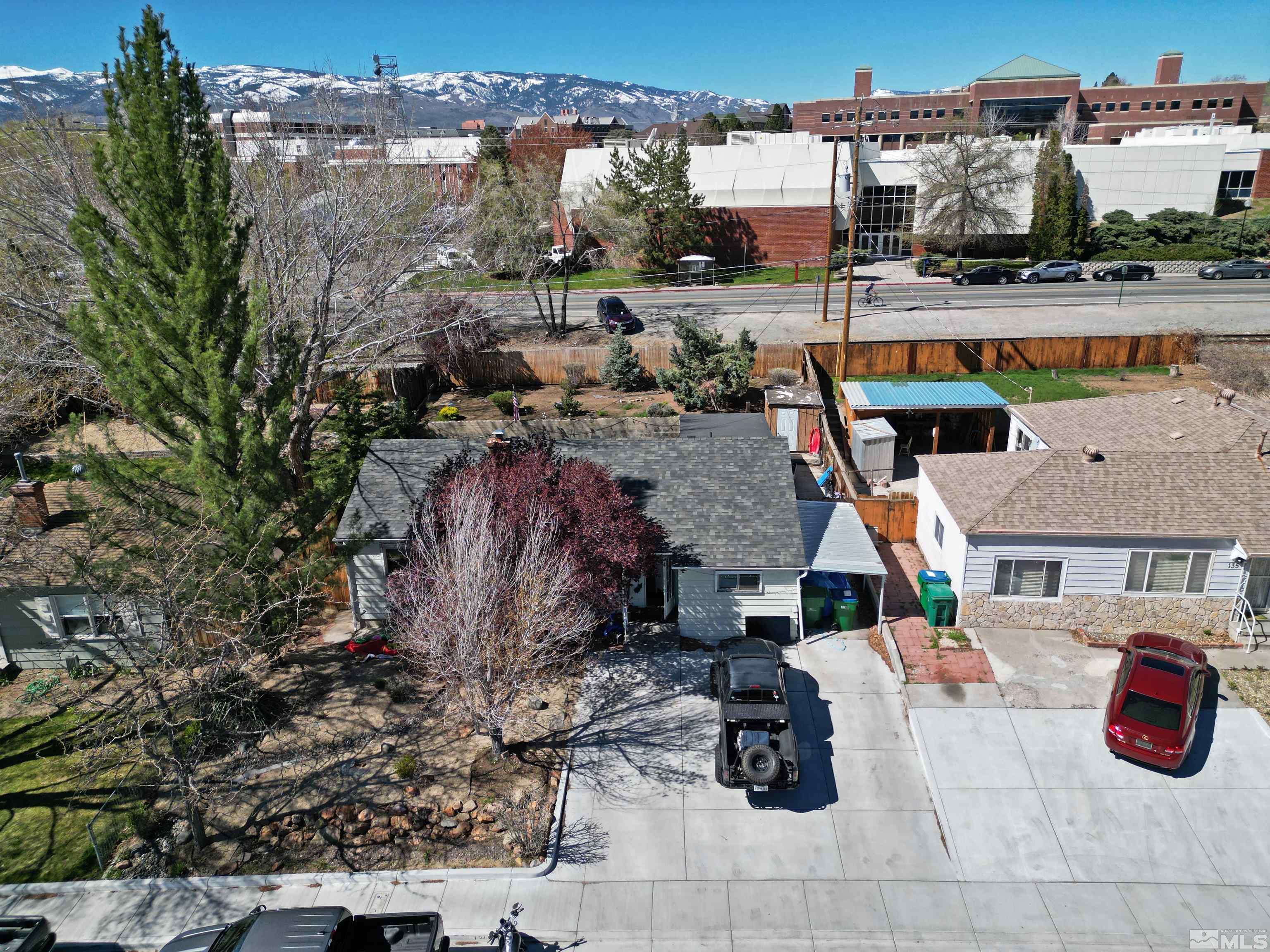 121 Bartlett Street Reno, NV 89512 - Photo 23 of 27 a view of swimming pool with outdoor seating and city view