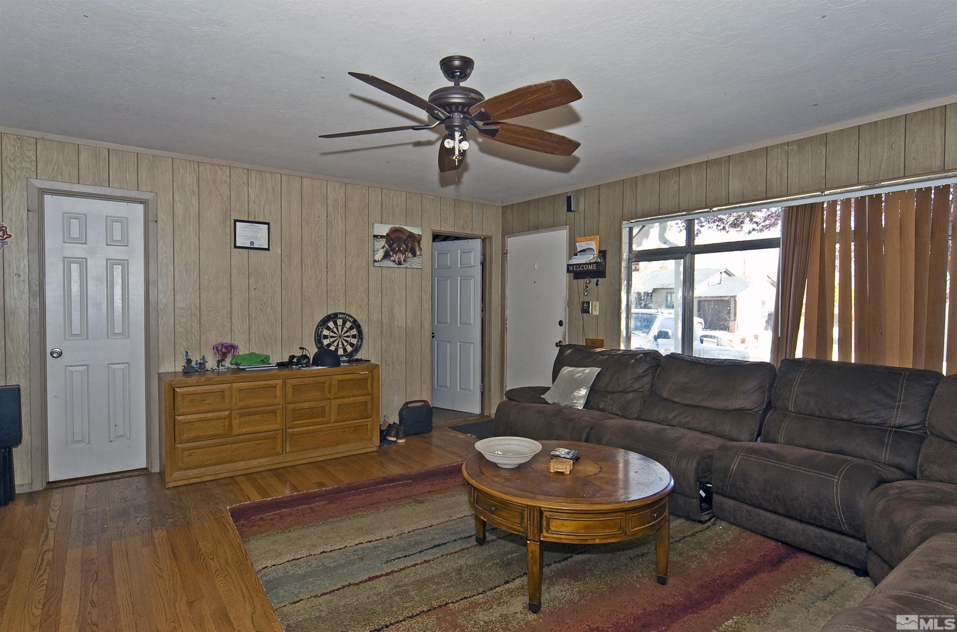 121 Bartlett Street Reno, NV 89512 - Photo 4 of 27 a living room with furniture and a large window