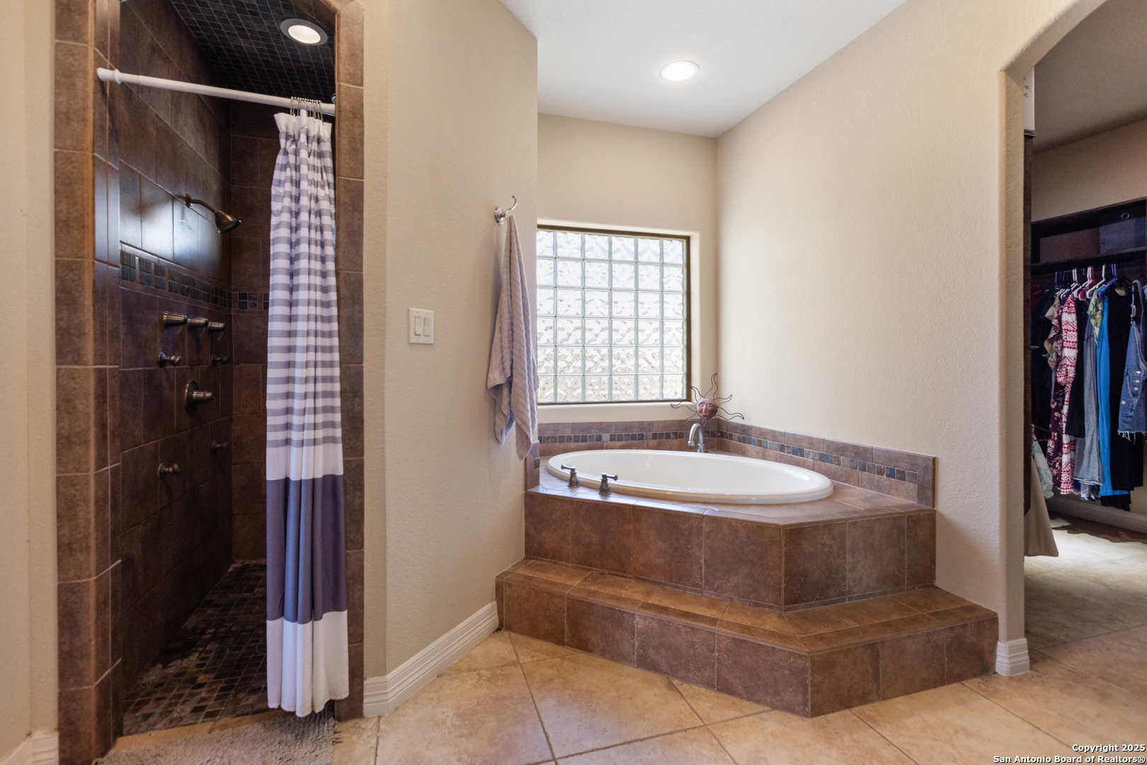 338 Tower Road San Antonio, TX 78223 - Photo 13 of 26 a spacious bathroom with a sink and a mirror