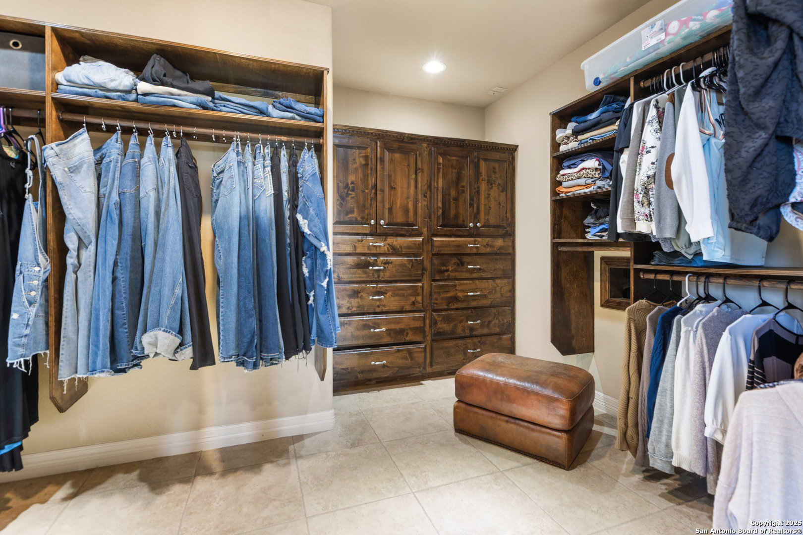 338 Tower Road San Antonio, TX 78223 - Photo 15 of 26 a view of walk in closet with clothes and shoes