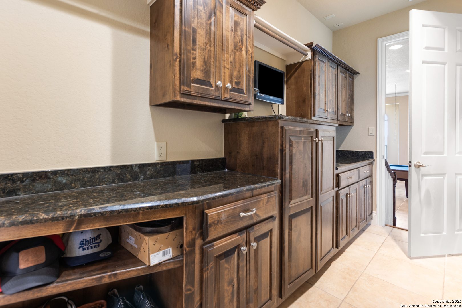 338 Tower Road San Antonio, TX 78223 - Photo 17 of 26 a kitchen with stainless steel appliances granite countertop a refrigerator a stove and a microwave
