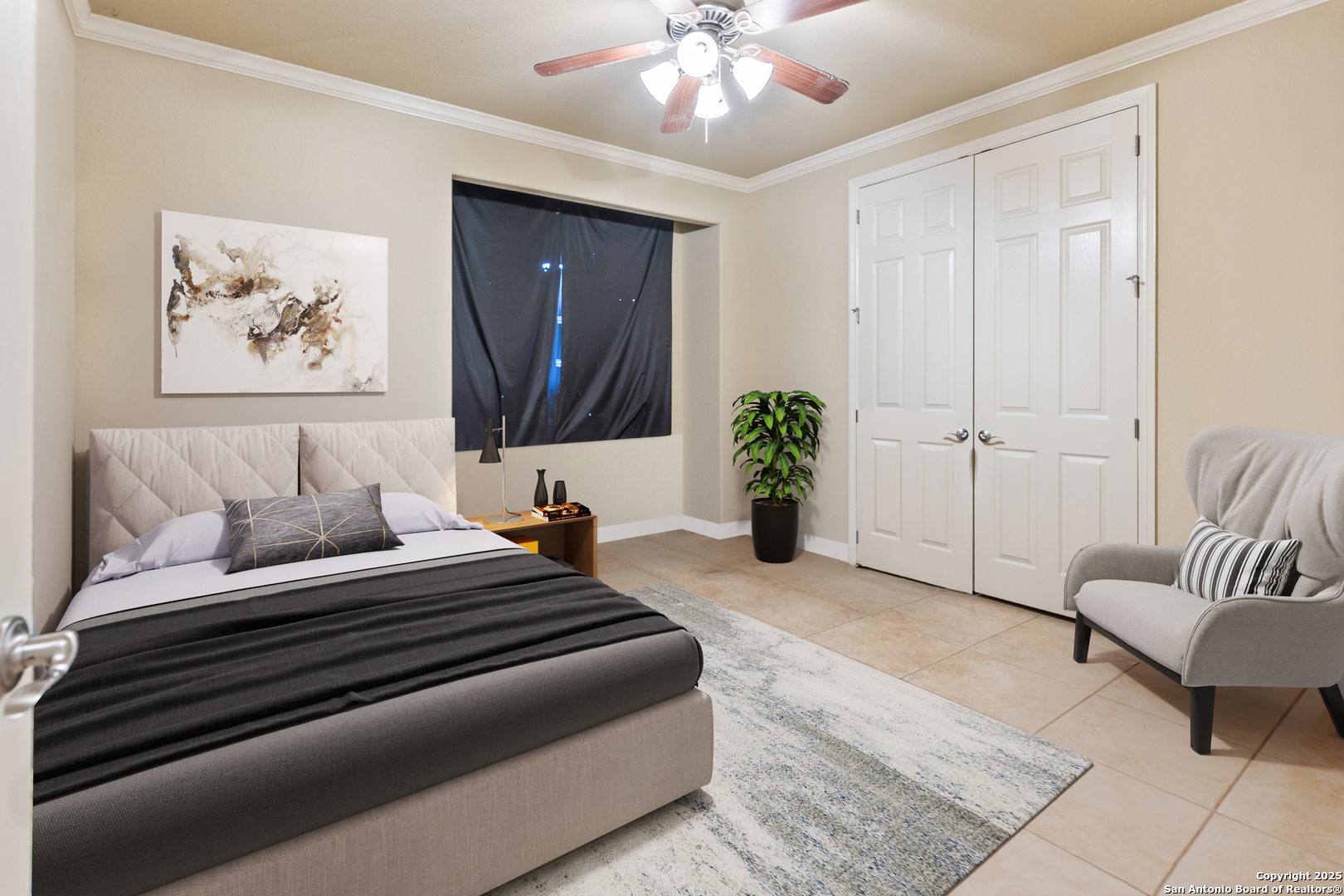 338 Tower Road San Antonio, TX 78223 - Photo 19 of 26 a spacious bedroom with a bed and a chandelier