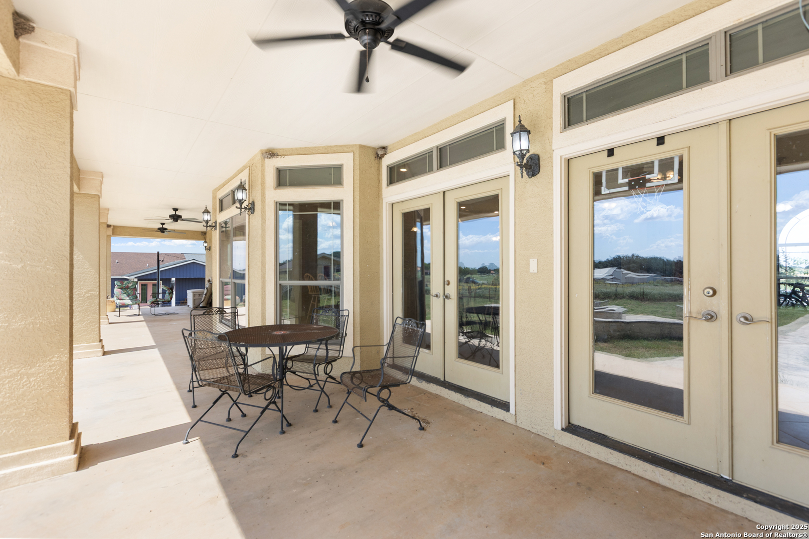 338 Tower Road San Antonio, TX 78223 - Photo 23 of 26 a view of a hall with dining area and glass door