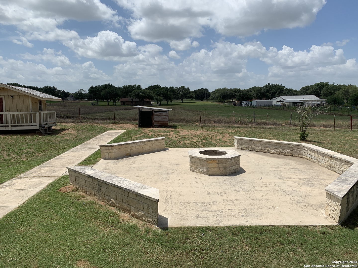338 Tower Road San Antonio, TX 78223 - Photo 25 of 26 a view of a lake with houses in the background