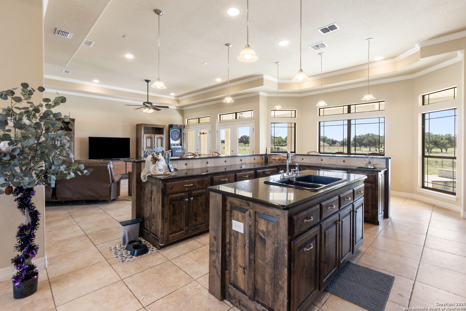 338 Tower Road San Antonio, TX 78223 - Photo 7 of 26 a kitchen with granite countertop a sink and a stove